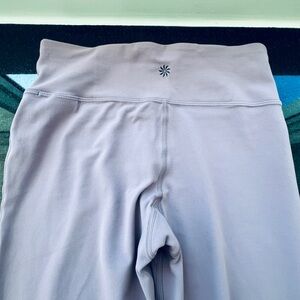 ATHLETA GIRL HIGH RISE CHIT CHAT FLARE PANT size 12 color between mauve/lavendar